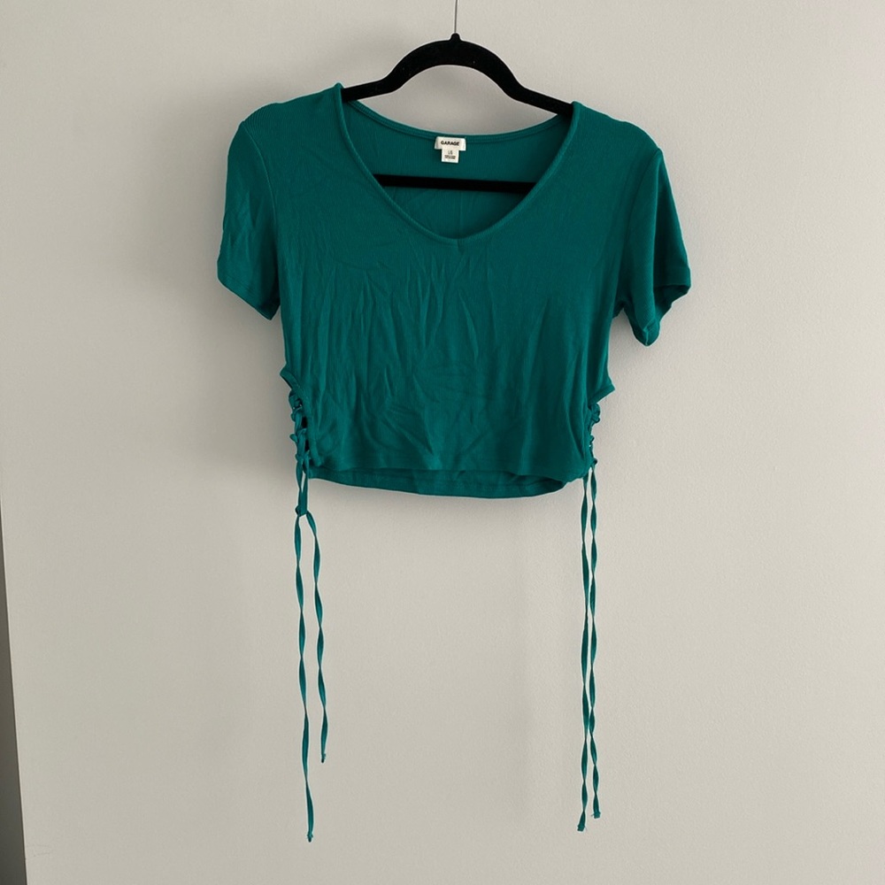 Garage women’s turquoise ribbed t-shirt with lace sides - size large
